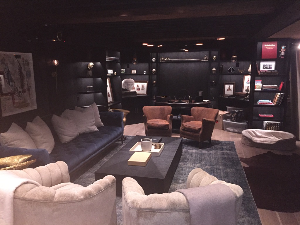 Dark media room with recessed and accent lighting