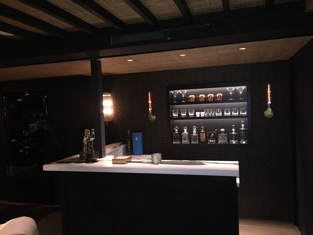 Commercial bar counter with focused overhead lighting