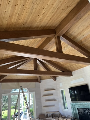 Exposed wood beam ceiling and recessed lighting