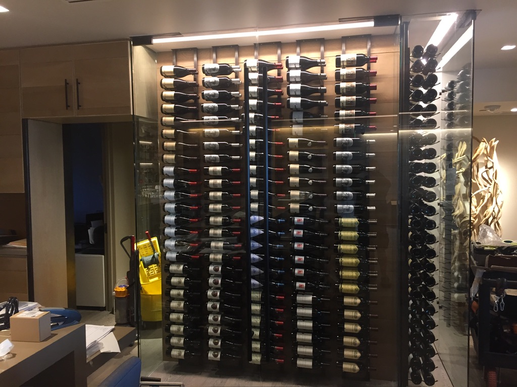 Illuminated display wall in a finished commercial interior